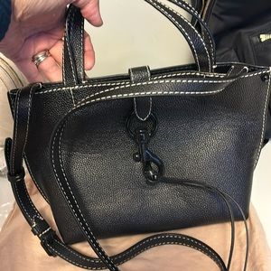 Black Rebecca minkoff. Never carried tag is with it but not attached!